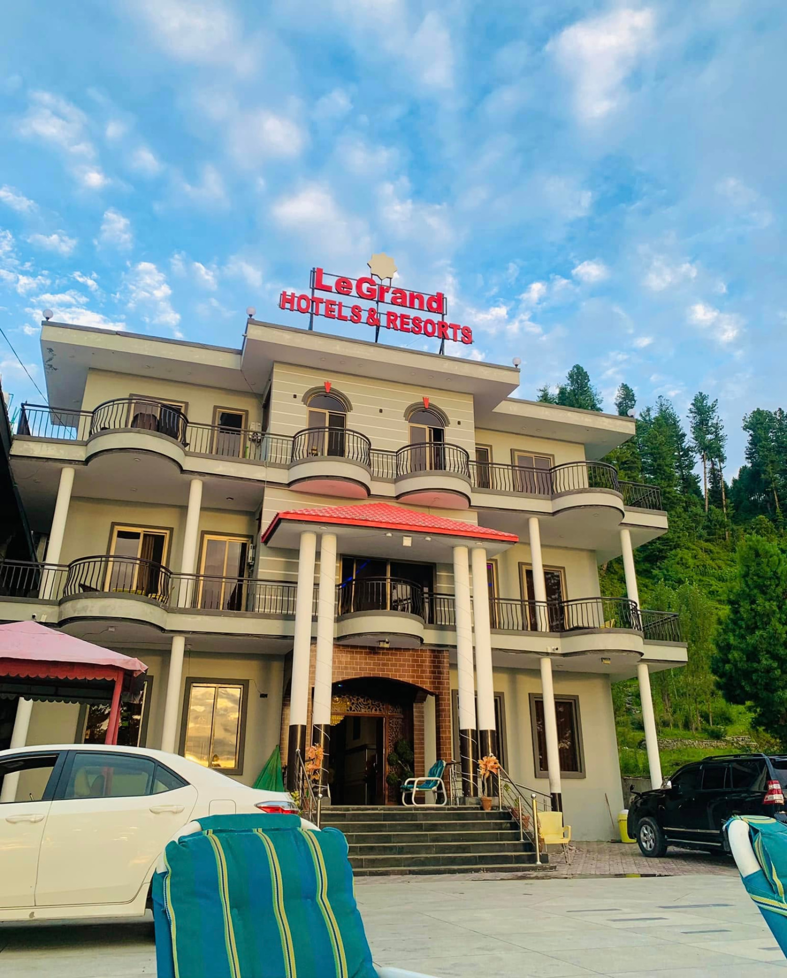 Hotel Le Grand in the evening beside pine forest